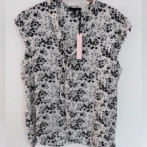 Sleeveless Tie Neck Blouse